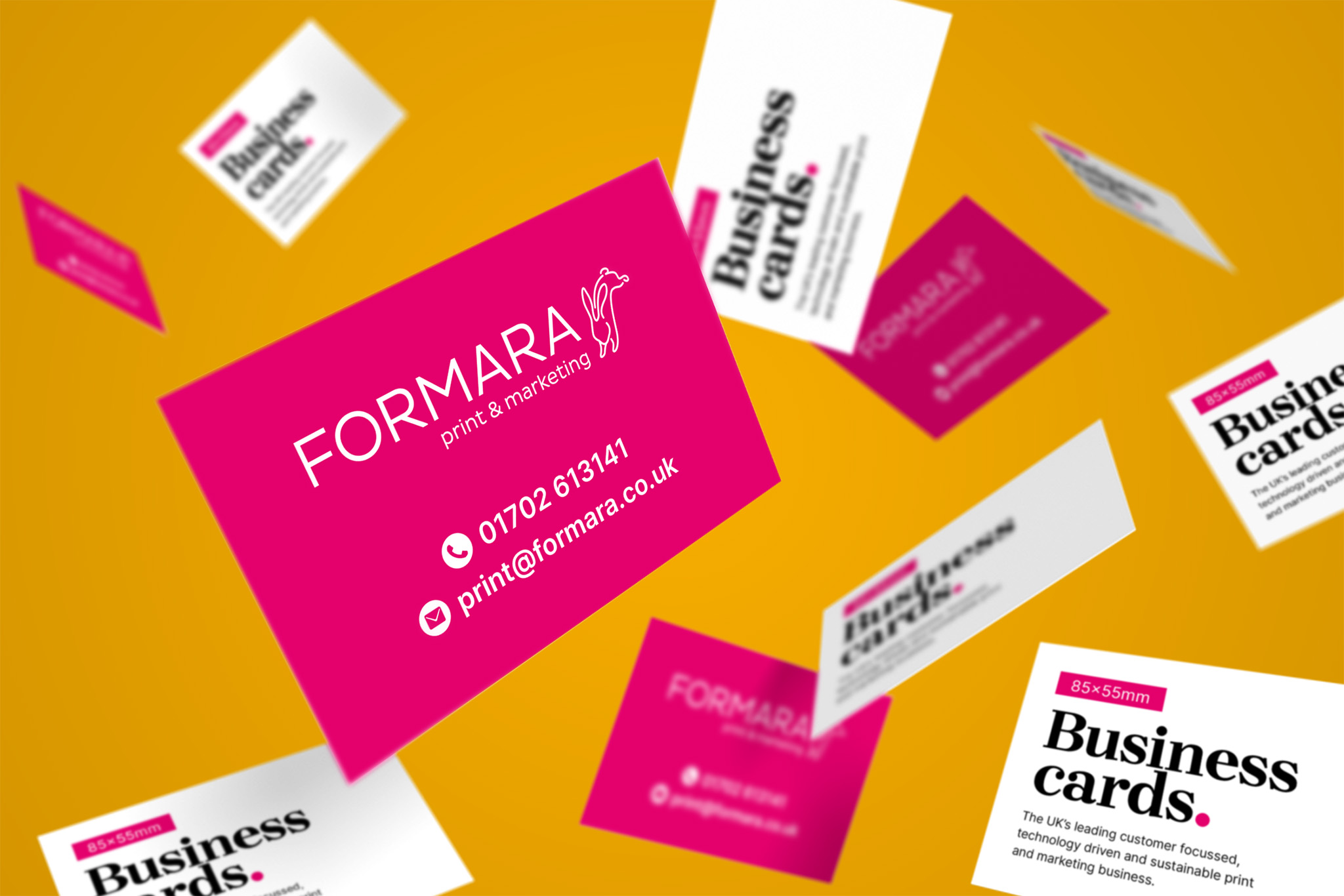 pink and white double sided business cards floating randomly on a yellow background