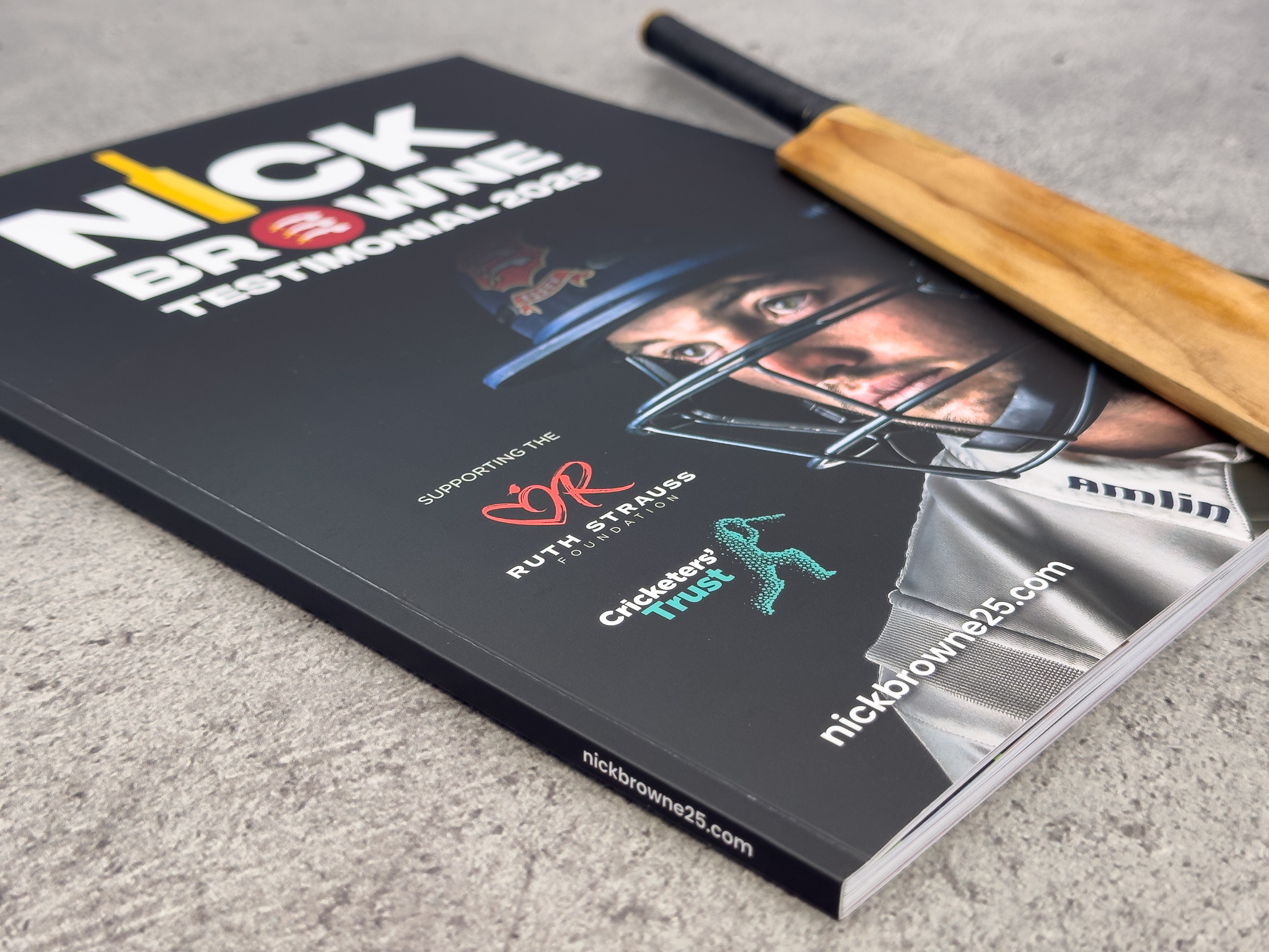 Nick Browne testimonial brochure 2023 with cricket bat, supporting Ruth Strauss Foundation and Cricketers' Trust