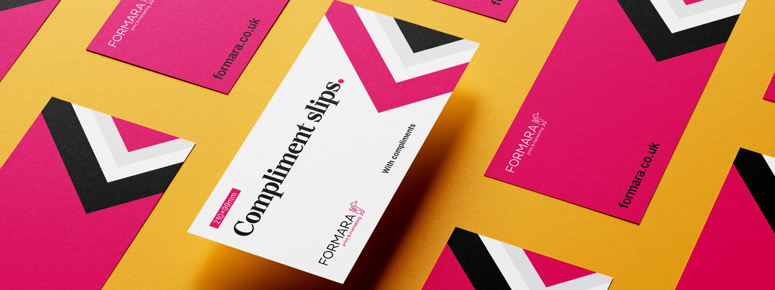 Envelope with "Compliment slips" text and vibrant geometric design, surrounded by matching business cards on yellow backgroun